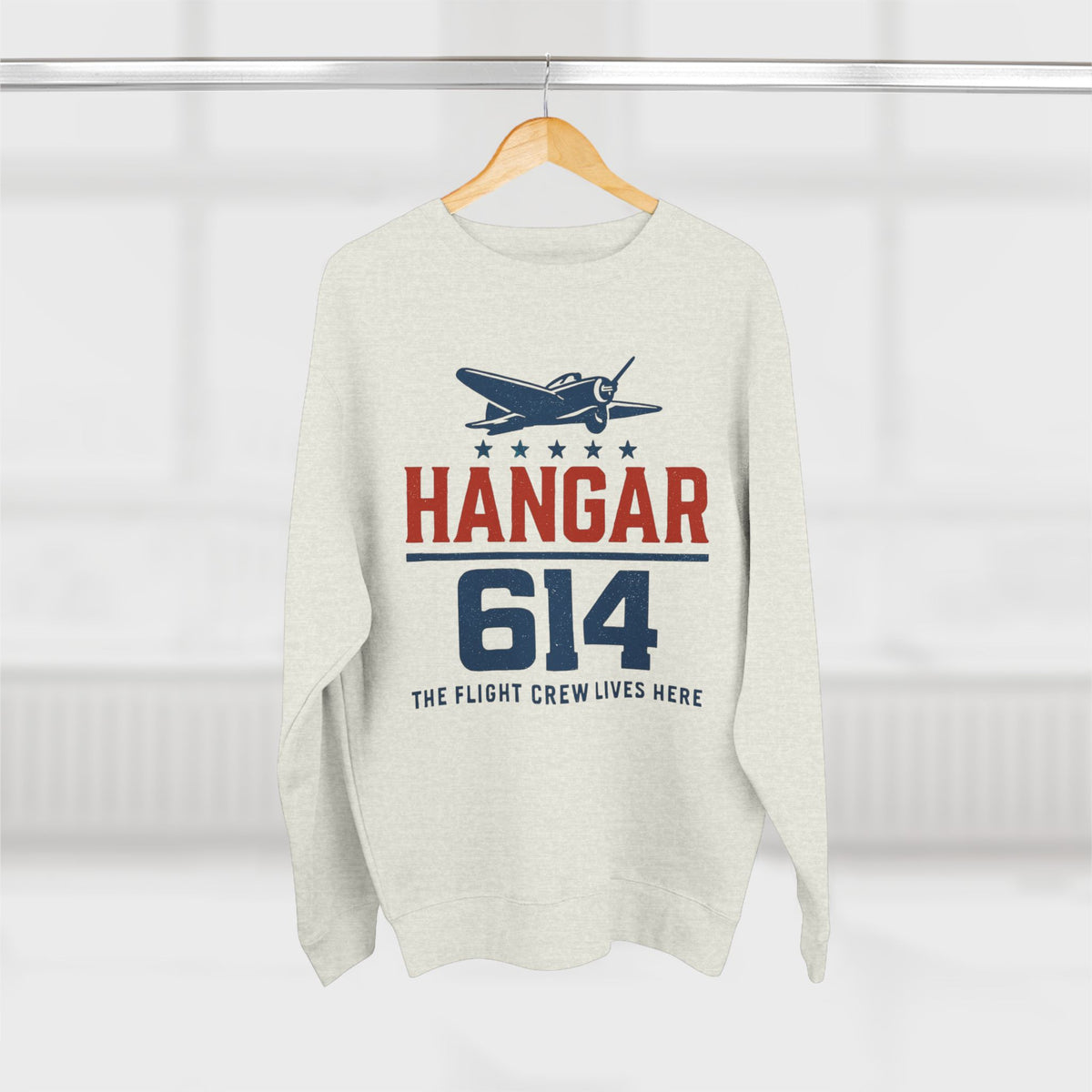 Oatmeal heather Hangar 614 Retro Crew Sweatshirt displayed on a hanger