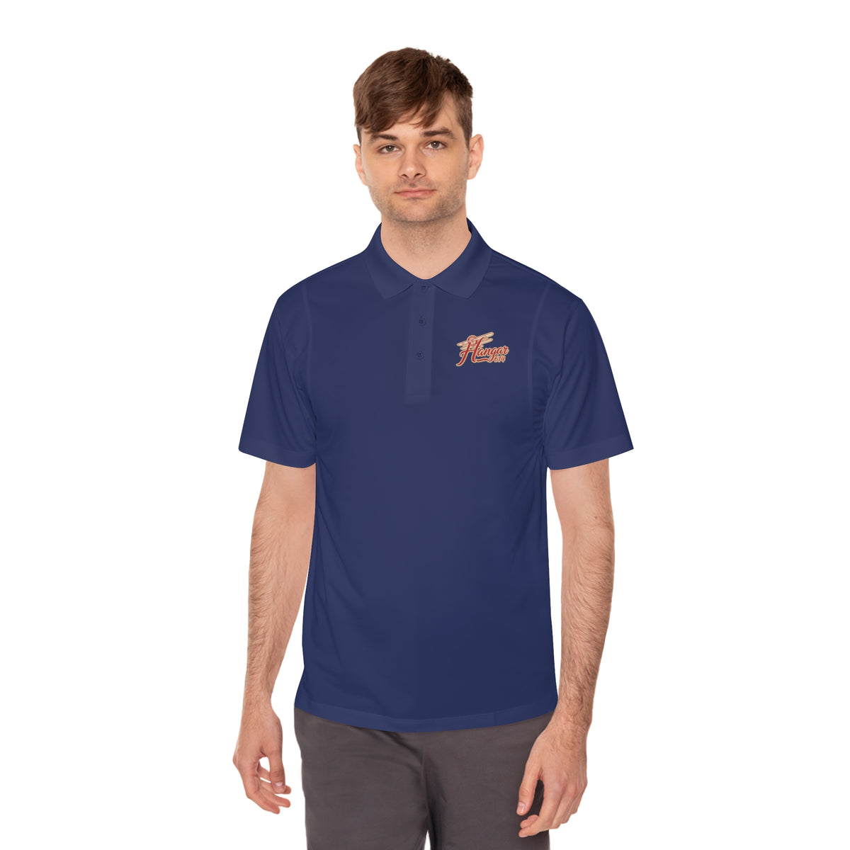 True navy Hangar 614 men's performance polo worn from the front